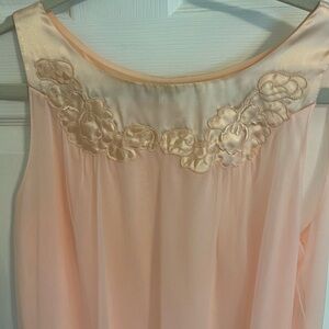Vintage lingerie in perfect condition. Beautiful light peach color.